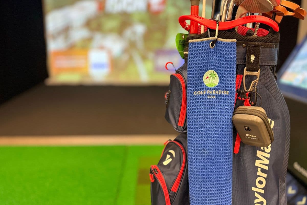 Golf clubs and simulator detail at Golf Paradise Club